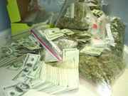 Piles_of_money_and_weed.jpg