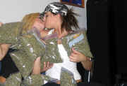 Girls_kissing_with_bags_of_weed.jpg