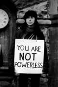 Gilrl_with_you_are_not_powerless_sign.jpg