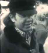 Owsley_talking_to_someone_in_a_crowd.jpg