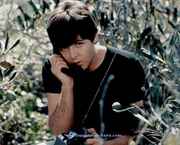 Paul_on_the_phone_in_woods.jpg