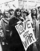 Girl_with_love_not_war_sign.jpg