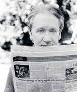 Maher_with_newspaper.jpg