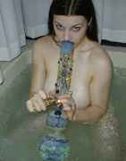 Girl_hits_bong_in_bathtub.jpg