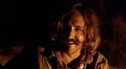 Dennis_Hopper_smiling_beside_fire_easy_rider.jpg