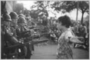 Soldiers_with_guns_pointed_at_hippie.jpg