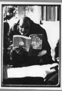 Neem_Korali_Baba_reading_Be_Here_Now.jpg