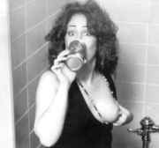 Grace_Slick_pulls_out_breast.jpg
