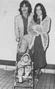 George_Harrison_with_baby.jpg