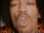 Jimi_blows_out_smoke.gif